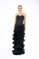Elegant dress with corset and overlapping ruffle skirt