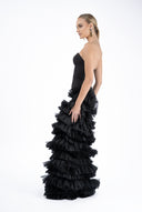 Elegant dress with corset and overlapping ruffle skirt