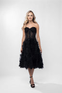Ruffled dress with structured bodice