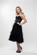 Ruffled dress with structured bodice