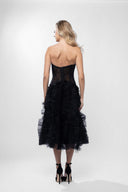 Ruffled dress with structured bodice
