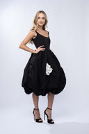 Black midi dress with white flower applique