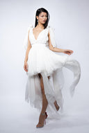 White dress with asymmetrical scarves