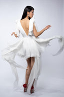 White dress with asymmetrical scarves
