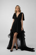 Black dress with long detachable skirt and dramatic ruffles