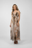 Long dress with exotic print and bare back with bow