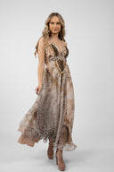Long dress with exotic print and bare back with bow