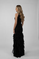 Long black dress with flowing ruffles