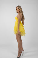 Short yellow strapless dress with gathered bodice