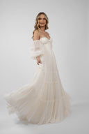 Sheer dress with spectacular volume