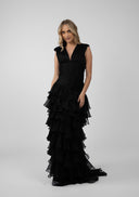 Long dress with gathered bodice and ample ruffles