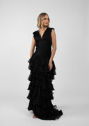 Long dress with gathered bodice and ample ruffles