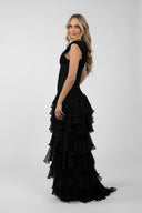 Long dress with gathered bodice and ample ruffles