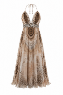 Long dress with exotic print and bare back with bow