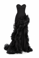 Asymmetric black silk dress with dramatic ruffles