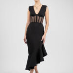 Rochie midi neagra cu corset transparent si fusta asimetrica